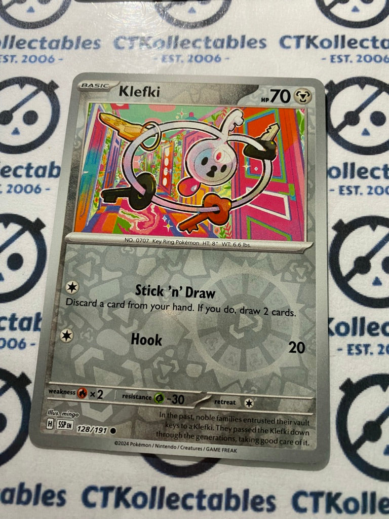 Klefki Reverse Holo #128/191 Surging Sparks Pokémon TCG 2024