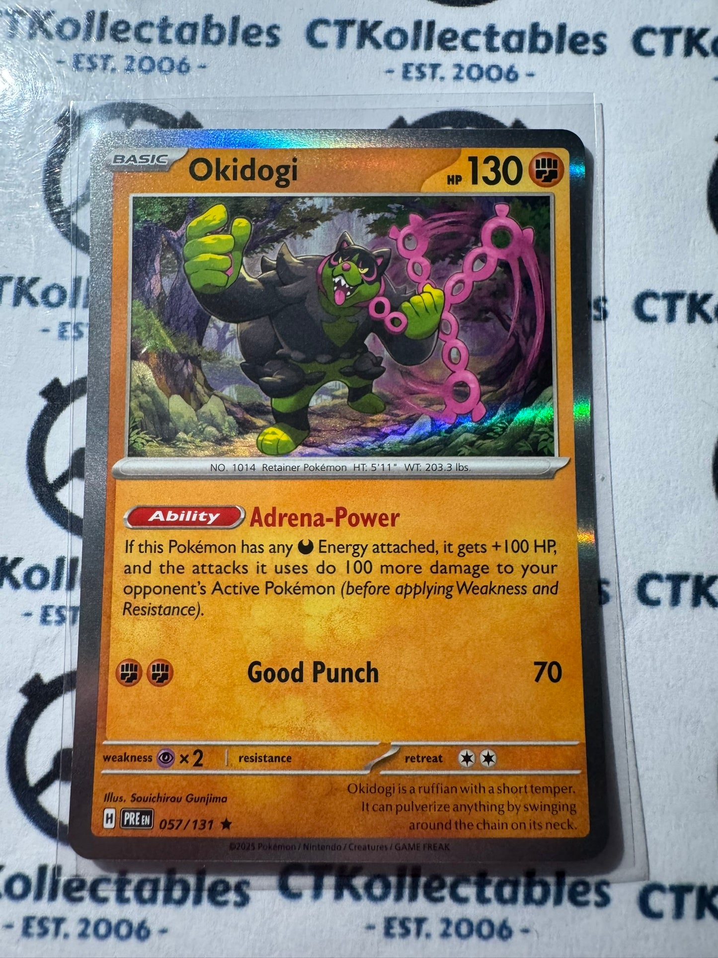 Okidogi Holo Rare #057/131 Prismatic Evolutions Pokemon Card