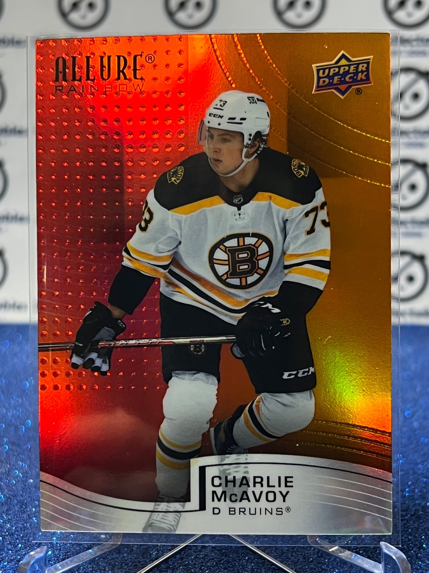 2021-22 UPPER DECK ALLURE CHARLIE McAVOY # R-73 RED/ORANGE RAINBOW BOSTON BRUINS HOCKEY CARD