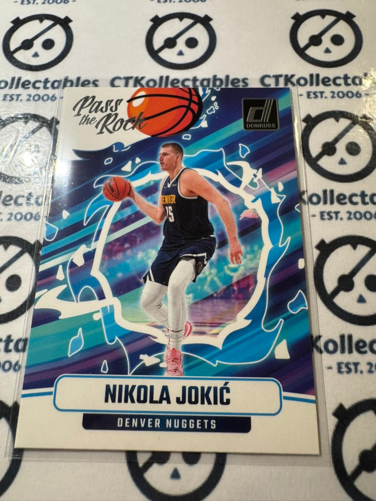 2024-25 NBA Panini Donruss Nikola Jokic Pass the rock #8 Nuggets
