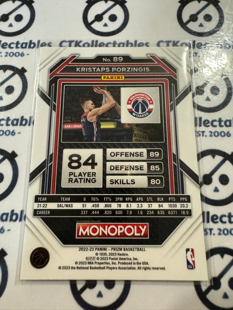 2022-23 NBA Panini Prizm Monopoly Kristaps Porzingis Base #89 Wizards