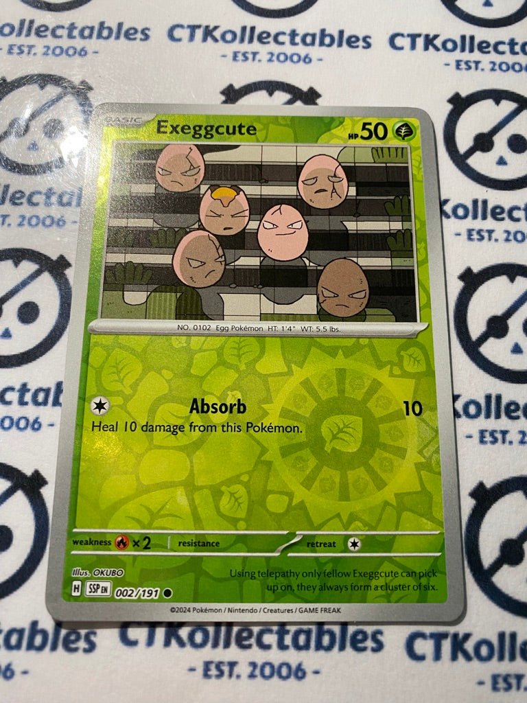 Exeggcute Reverse Holo #002/191 Surging Sparks Pokémon TCG 2024