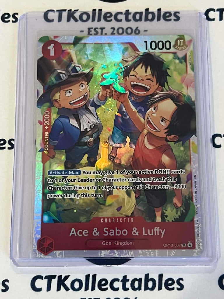One Piece - Carrying on his will Super Rare OP13-007 – Ace, Sabo & Luffy