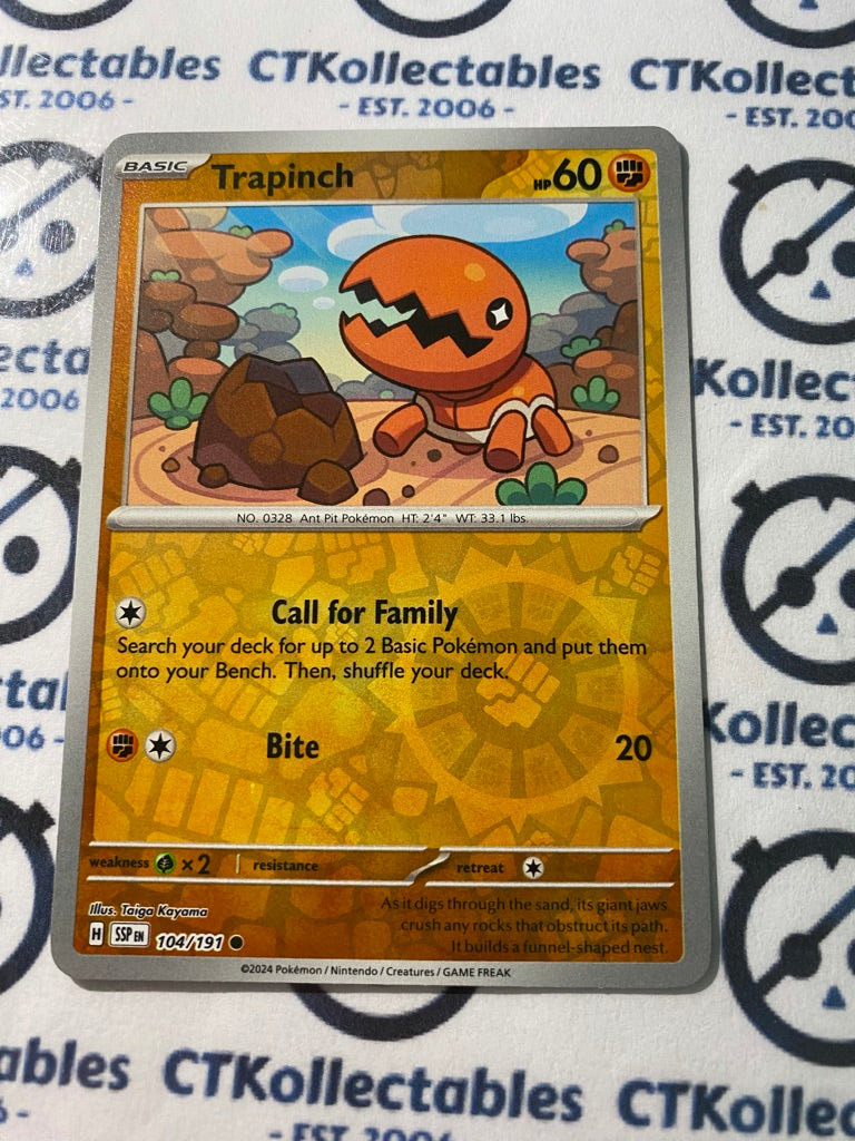 Trapinch Reverse Holo #104/191 Surging Sparks Pokémon TCG 2024