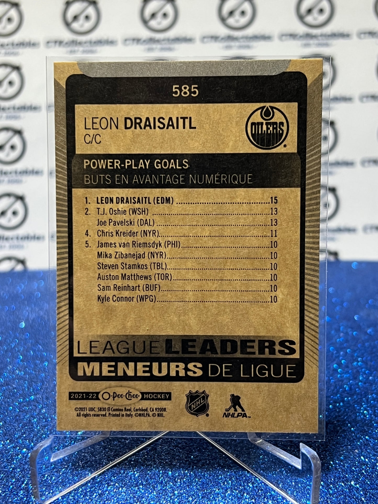 2021-22 O-PEE-CHEE LEON DRAISAITL # 585 LEAGUE LEADERS EDMONTON OILERS NHL HOCKEY CARD