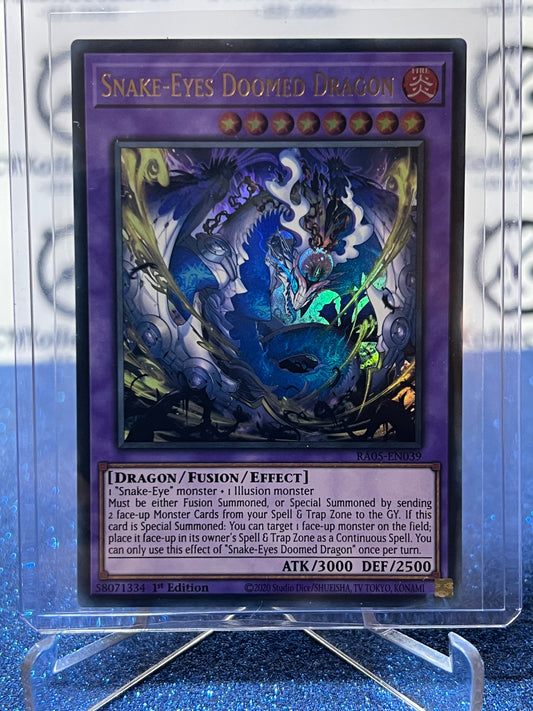 YU-GI-OH! RARITY COLLECTION SNAKE-EYES DOOMED DRAGON # RAO5-EN039  SECRET RARE GOLD 1ST EDITION TCG CARD
