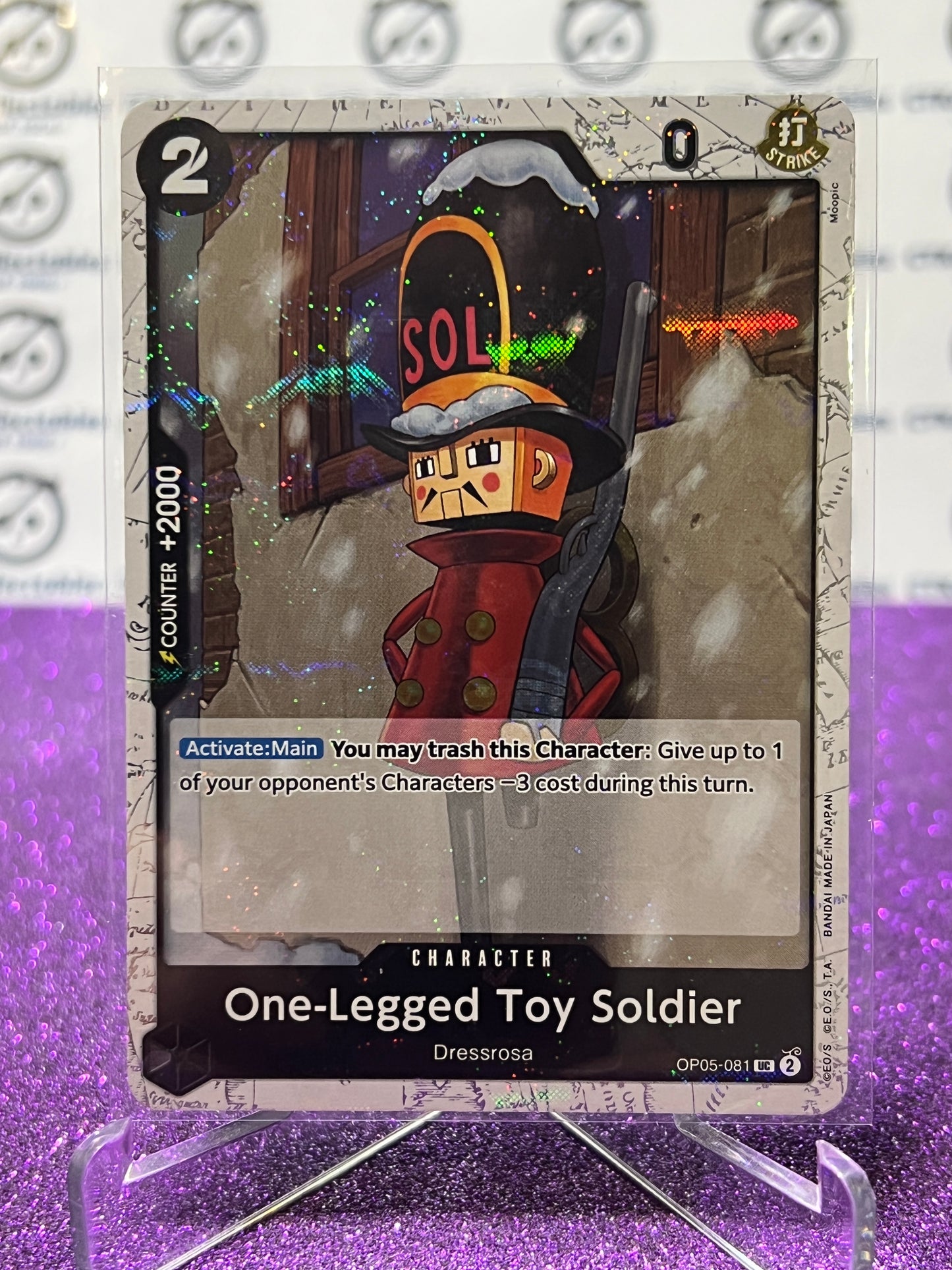 2024 ONE PIECE THE BEST ONE-LEGGED TOY SOLDIER # OP05-081 UC GLITTER FLAG FOIL TRADING GAME CARD