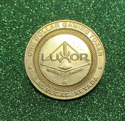 UNITED STATES LUXOR CASINO ONE DOLLAR GAMING TOKEN COIN VF/VF+  LAS VEGAS NEVADA
