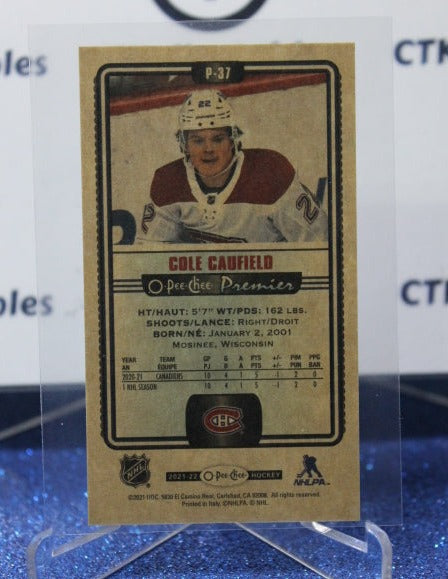 2021-22 O-PEE-CHEE PREMIER COLE CAUFIELD # P-37 ROOKIE TALLBOYS MONTREAL CANADIENS NHL HOCKEY CARD