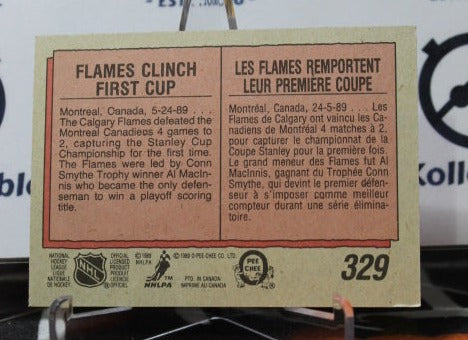 1989-90 O-PEE-CHEE FLAMES CLINCH # 329 STANLEY CUP CALGARY/ MONTREAL CANADIENS HOCKEY CARD