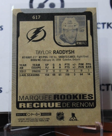 2021-22  O-PEE-CHEE TAYLOR RADDYSH # 617 MARQUEE ROOKIE TAMPA BAY LIGHTNING HOCKEY CARD