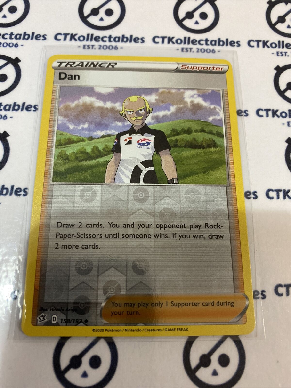 Dan Trainer #158/192 Reverse Holo Uncommon Pokémon Card Rebel Clash