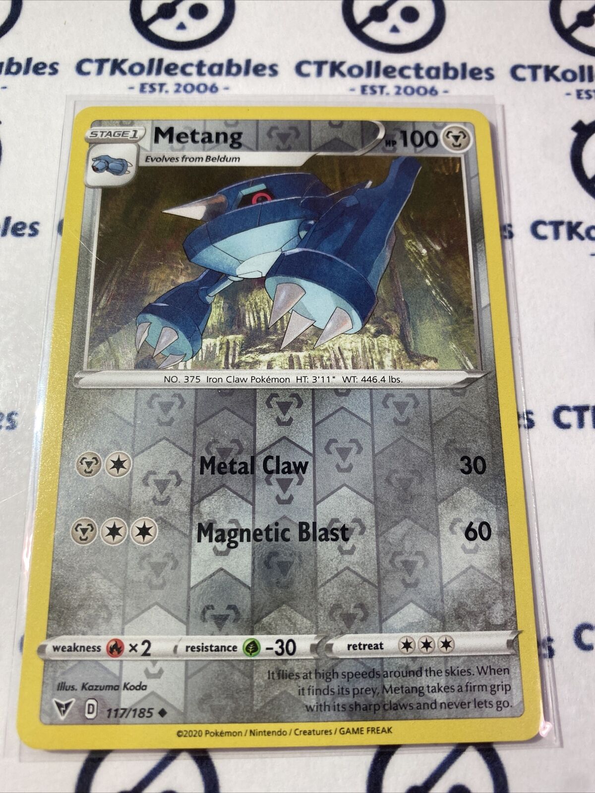 Metang Reverse Holo #117/185 Pokémon Card Vivid Voltage